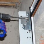 how to fix garage door cable